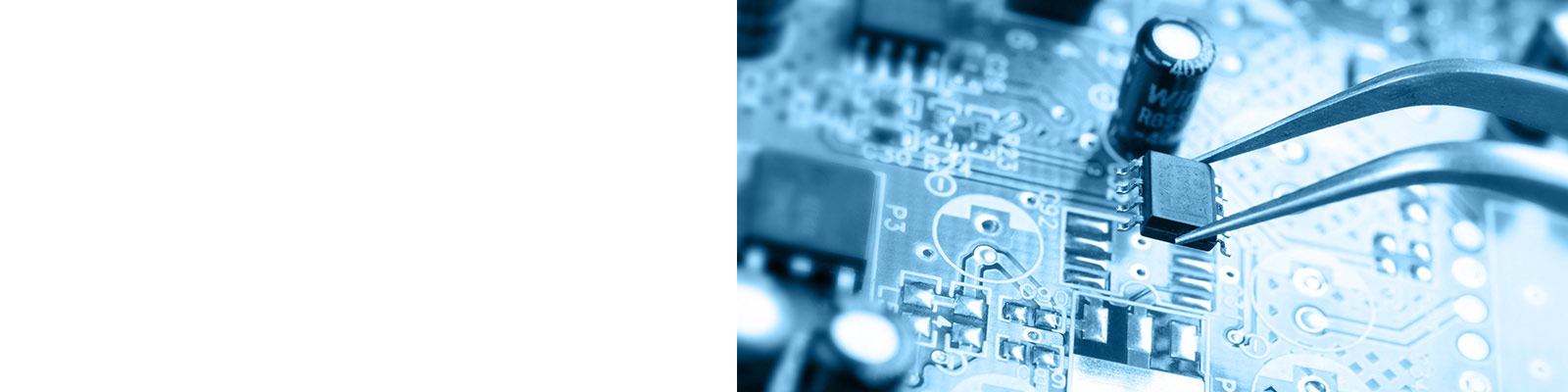 Bench technician testing turbine control cards